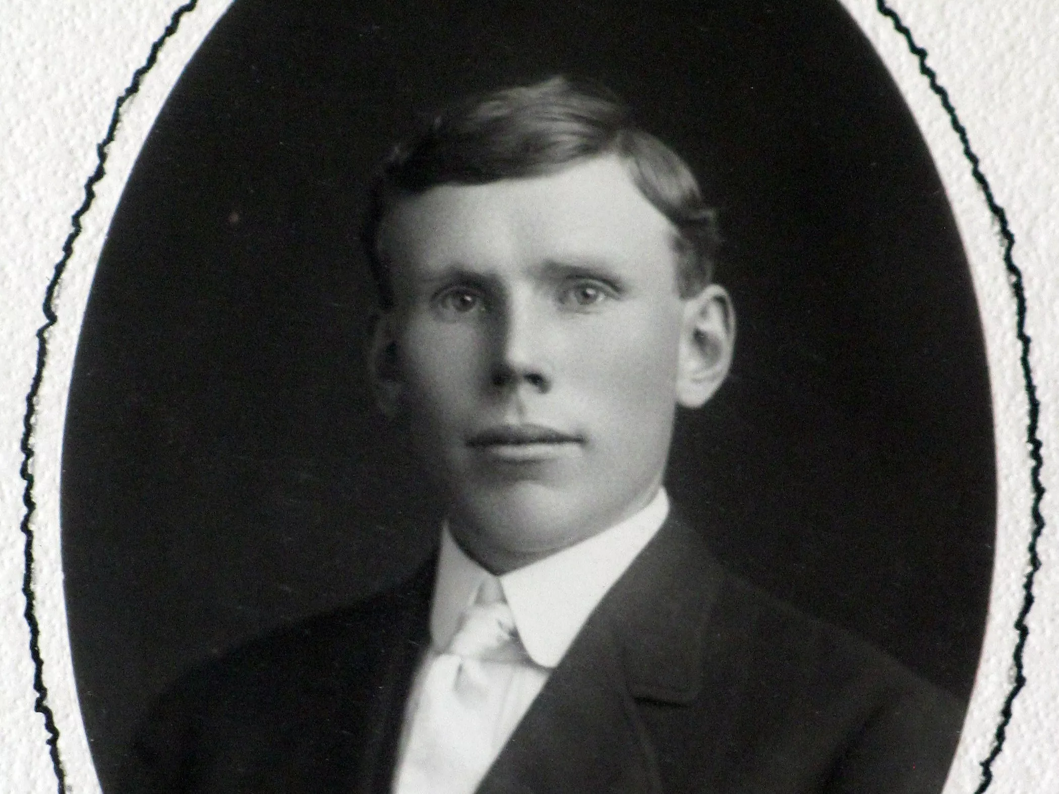 A black and white portrait photograph of Julius Bradford in 1910.