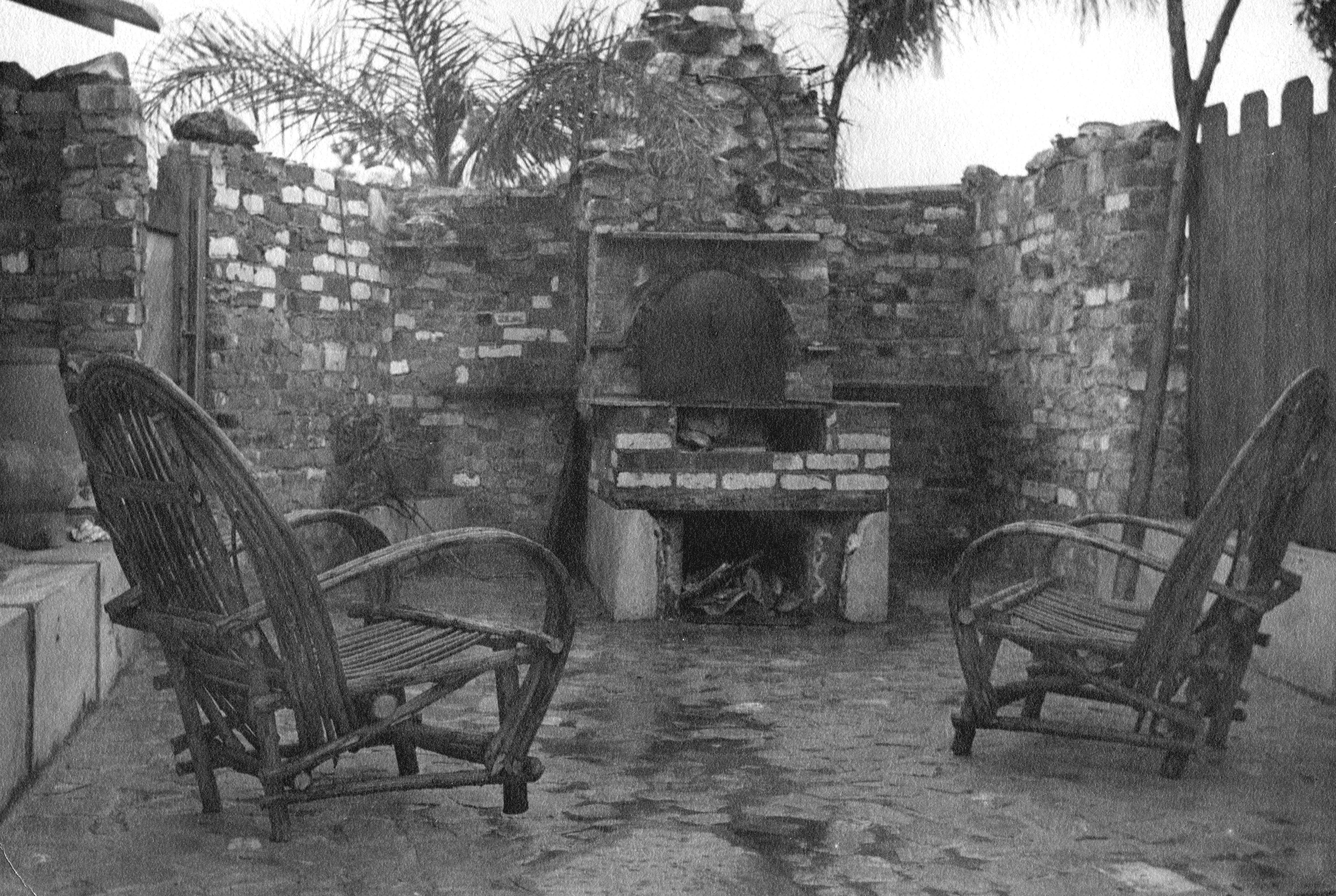 A black and white photograph of the rear patio area of the Arthur Thompson House in 1938.
