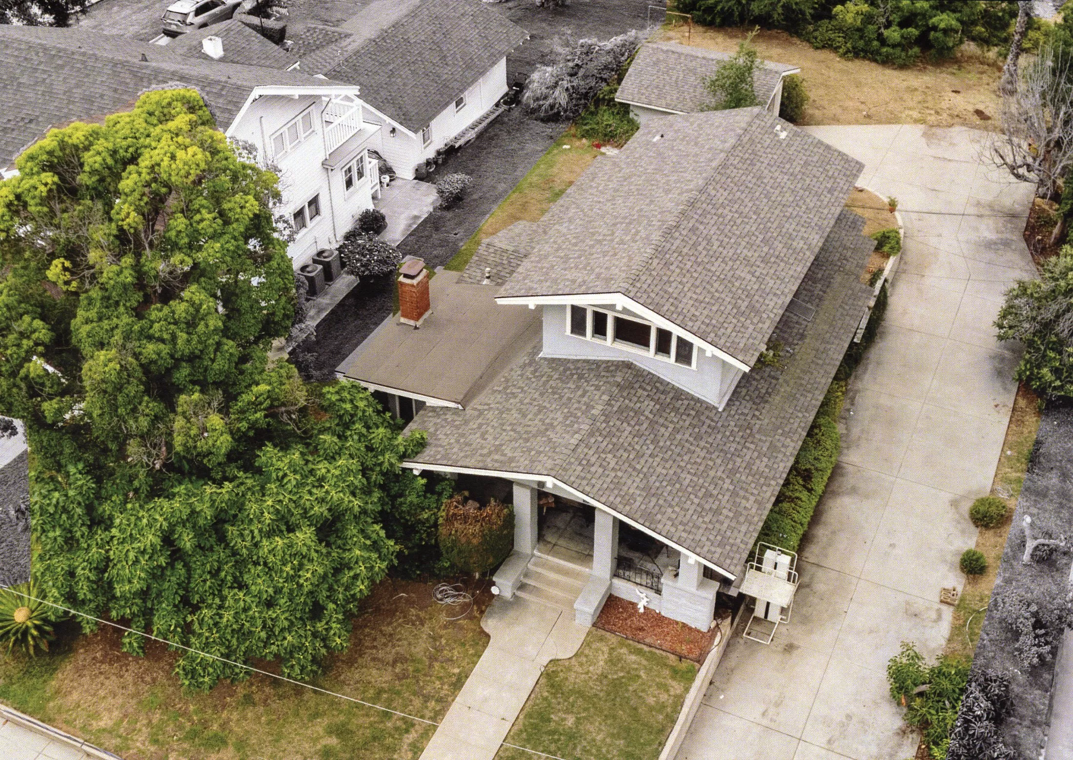 A colored bird&#039;s-eye view photo of the Louis Plummer House in 2023.