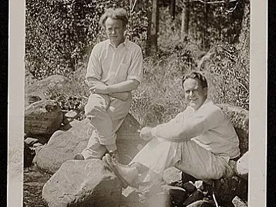 A black and white photograph of Charles Kassler (on the right side).