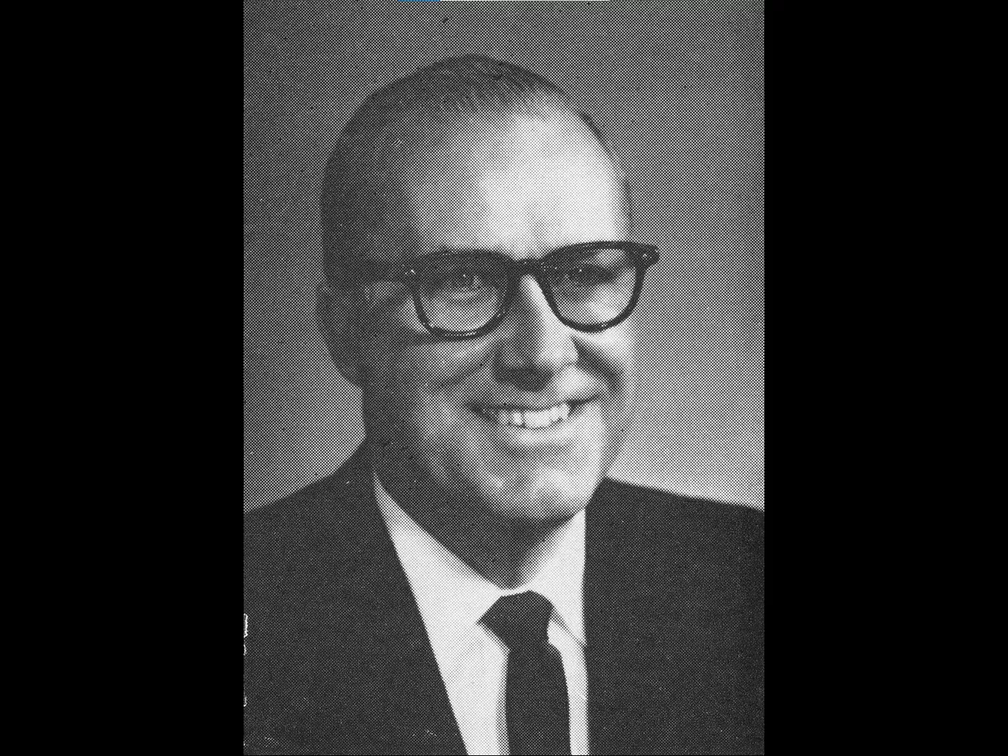 A black and white portrait photograph of Charles Wickett in 1961.