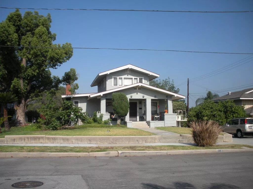A colored photo of the Louis Plummer House exterior in 2014 before the remodel.