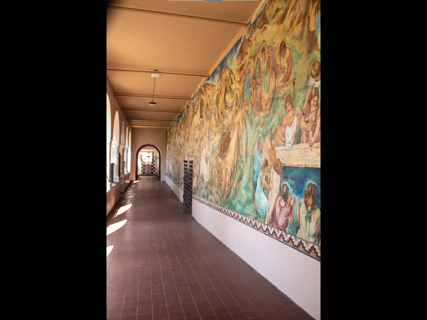 A colored photo of the fresco from the walkway in 2021.