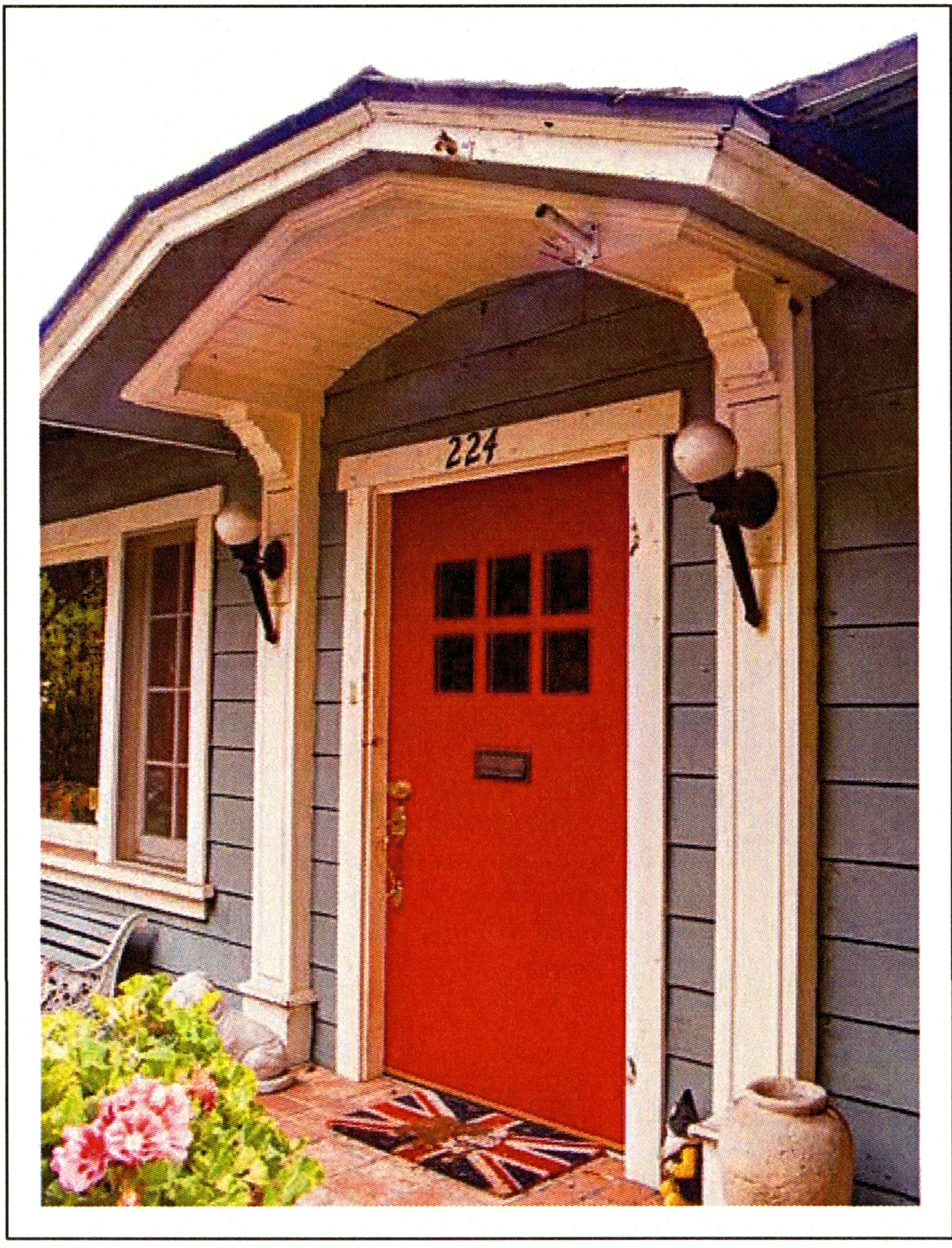 A colored photo of the front door detail for the John Menges House in 2017.