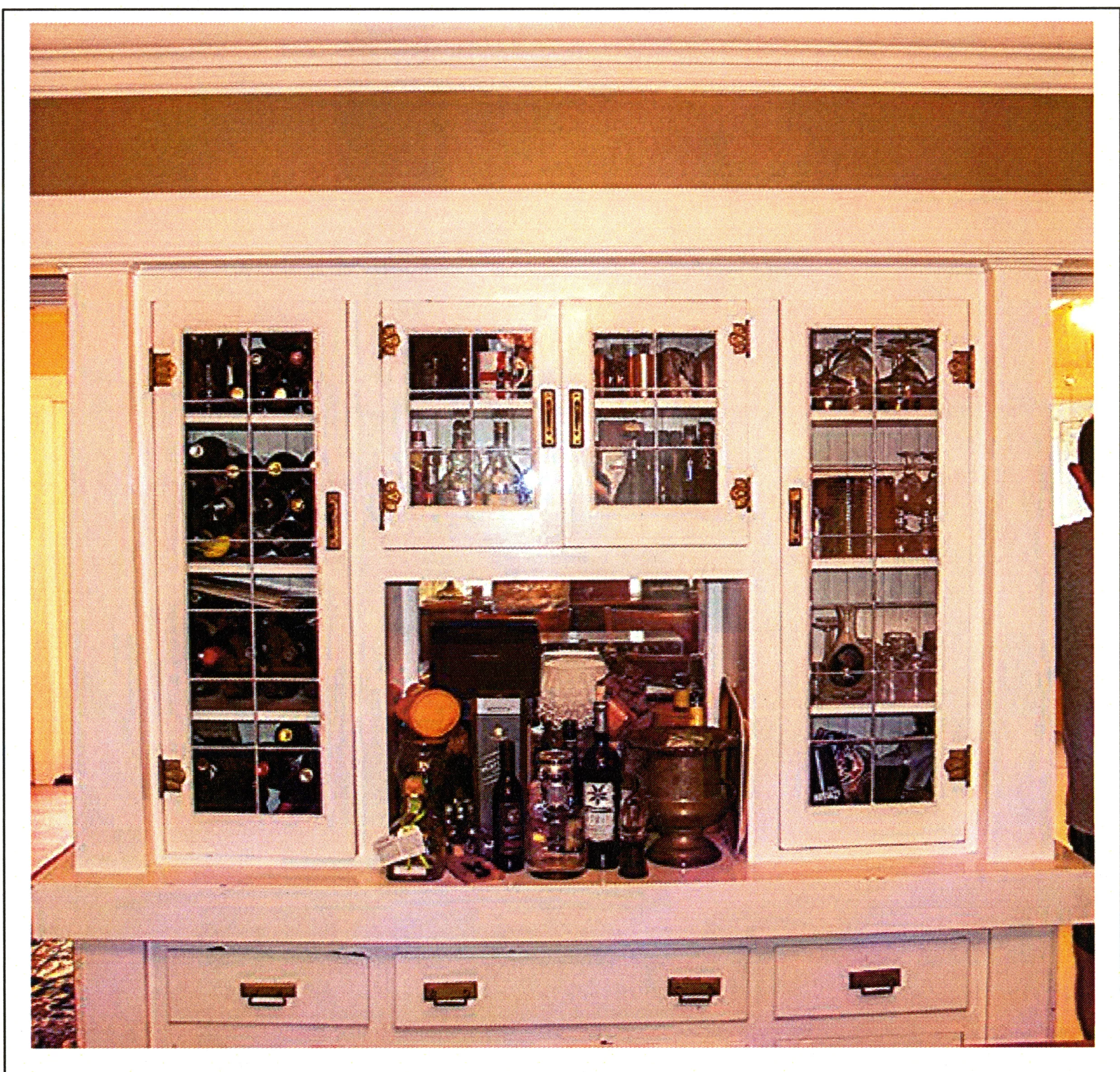 A colored photo of the original built-in cabinets inside the John Menges House in 2017.