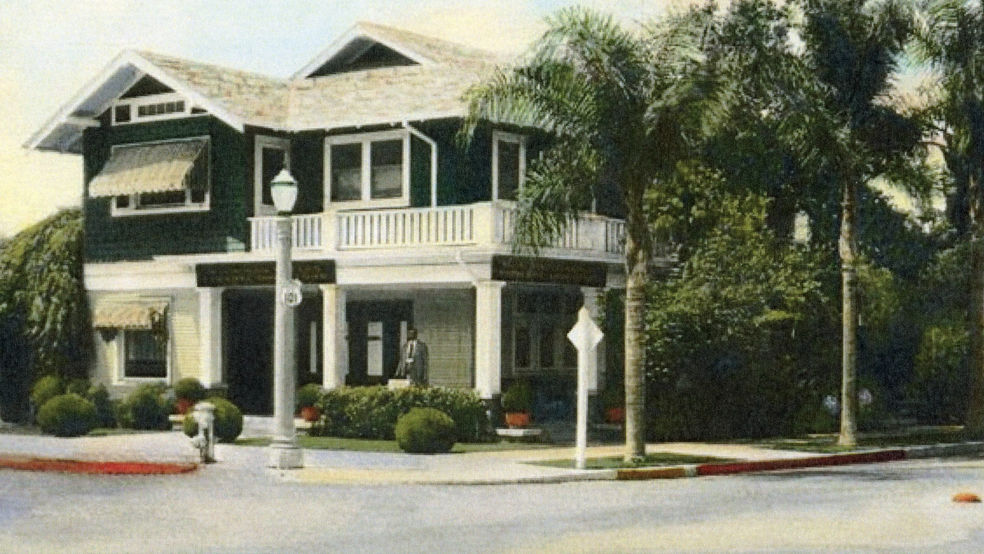 A colored photograph of the original mortuary for the Harry Suters House.