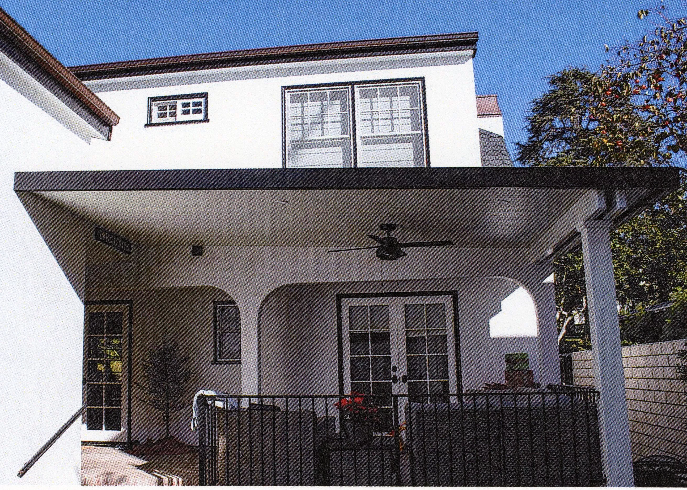 A colored photo of the rear exterior of the Earl Dysinger - Charles Schugt House in 2023.