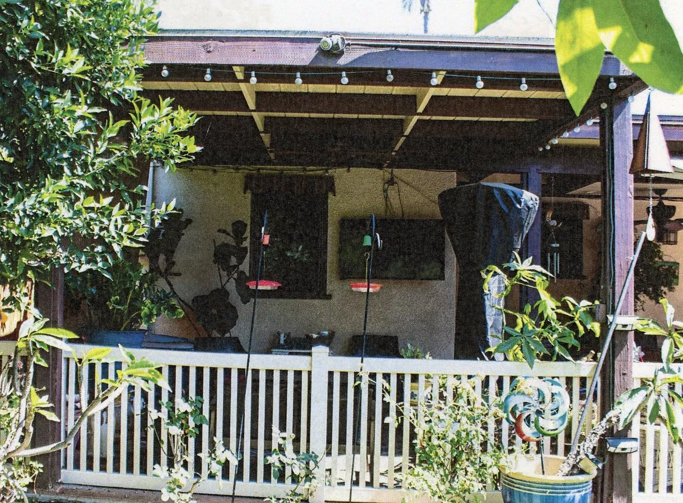 A colored photo of the rear exterior of the William N. Rollo House in 2024.