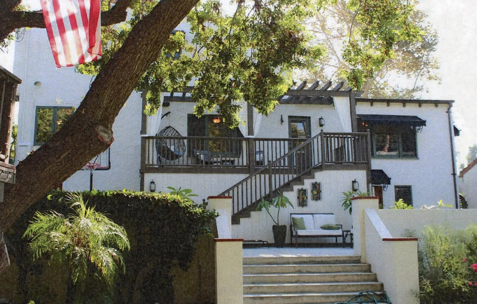 A colored photo of the rear of the Walter Joseph Cadman House in 2019.
