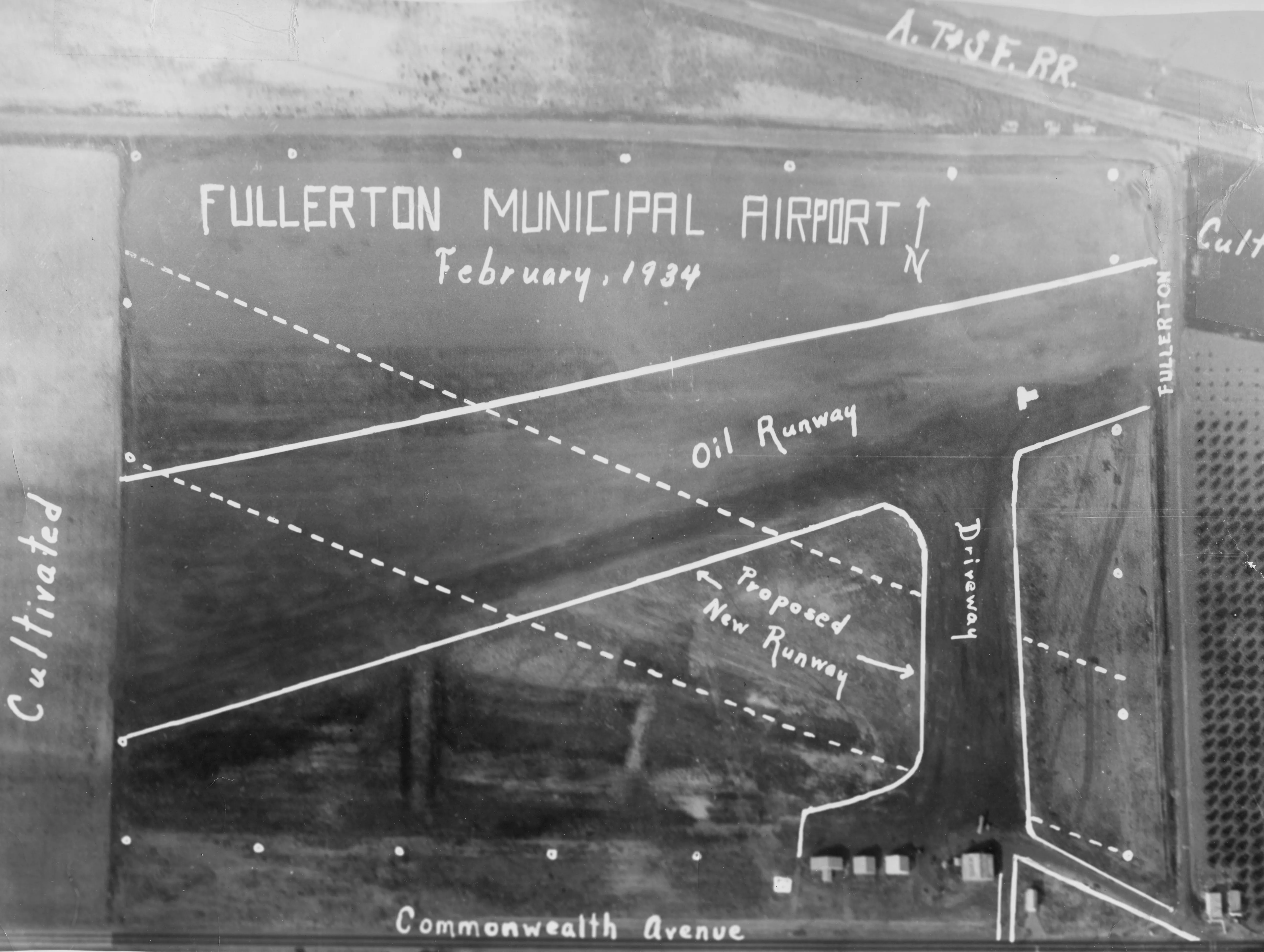 A digital scan of an aerial view of the Fullerton Municipal Airport runway in February 1934.