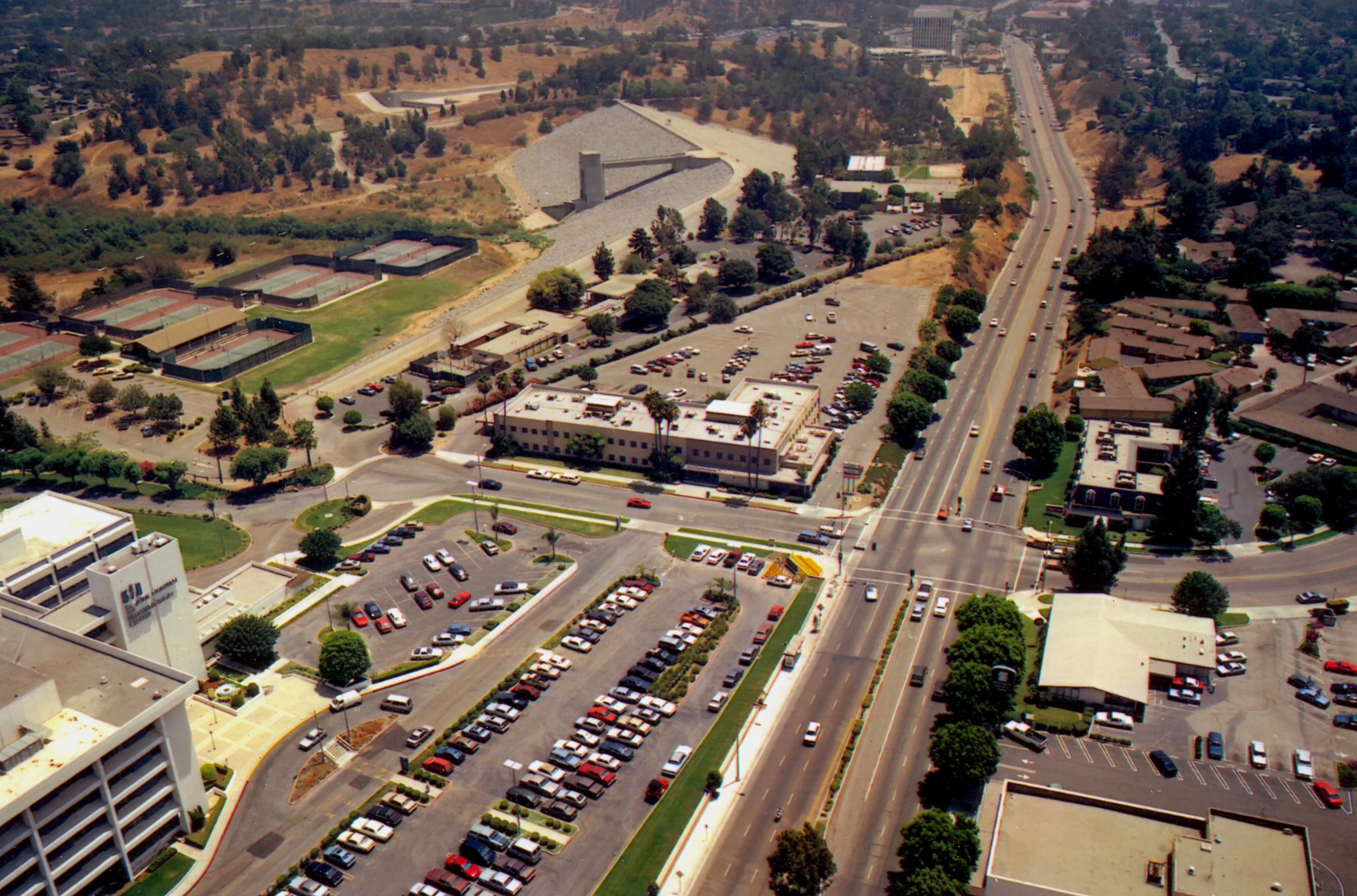 A digital scan of an aerial view of St. Jude Hospital and Brea Dam.