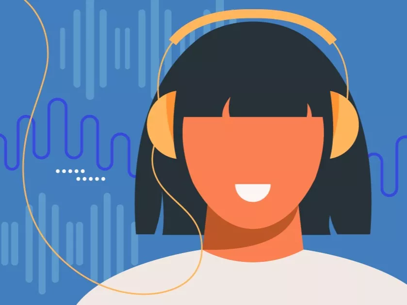 eBooks and eAudiobooks. A person is smiling while listening to something playing through their headphones.