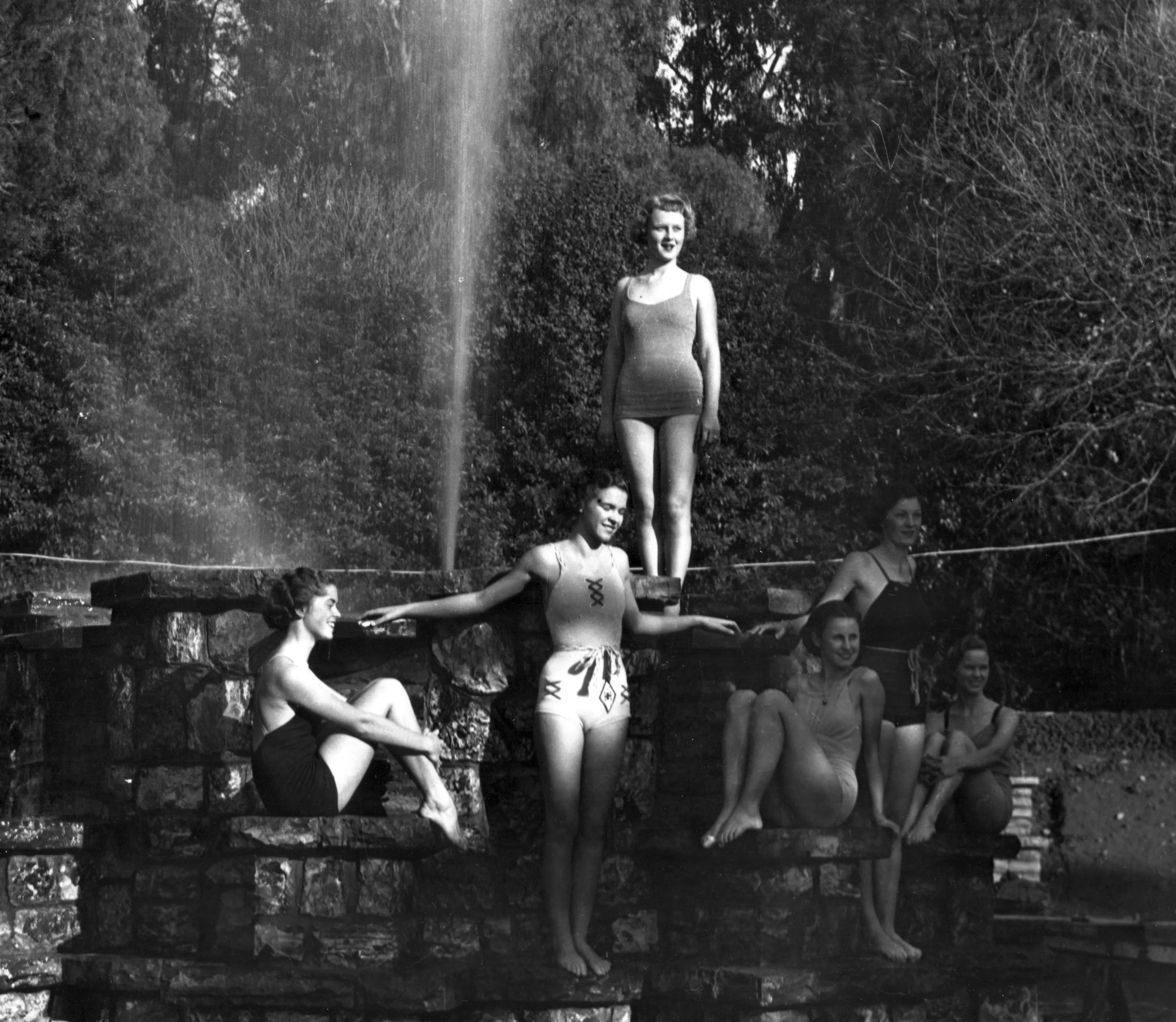 A black and white photograph of several women at the Hillcrest Park Fountain, taken in 1936.