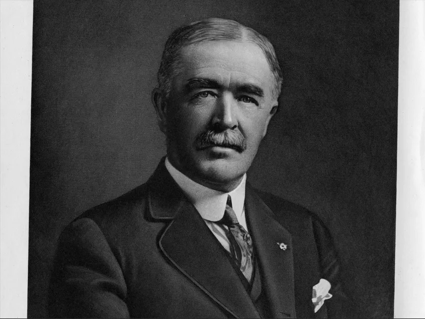 A black and white portrait photograph of Charles Chapman in 1921.
