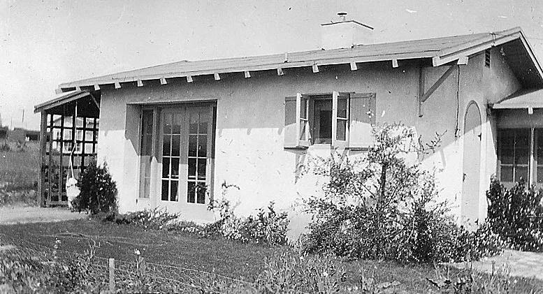 A black and white photograph of the completed back house of the Raymond Starbuck House.