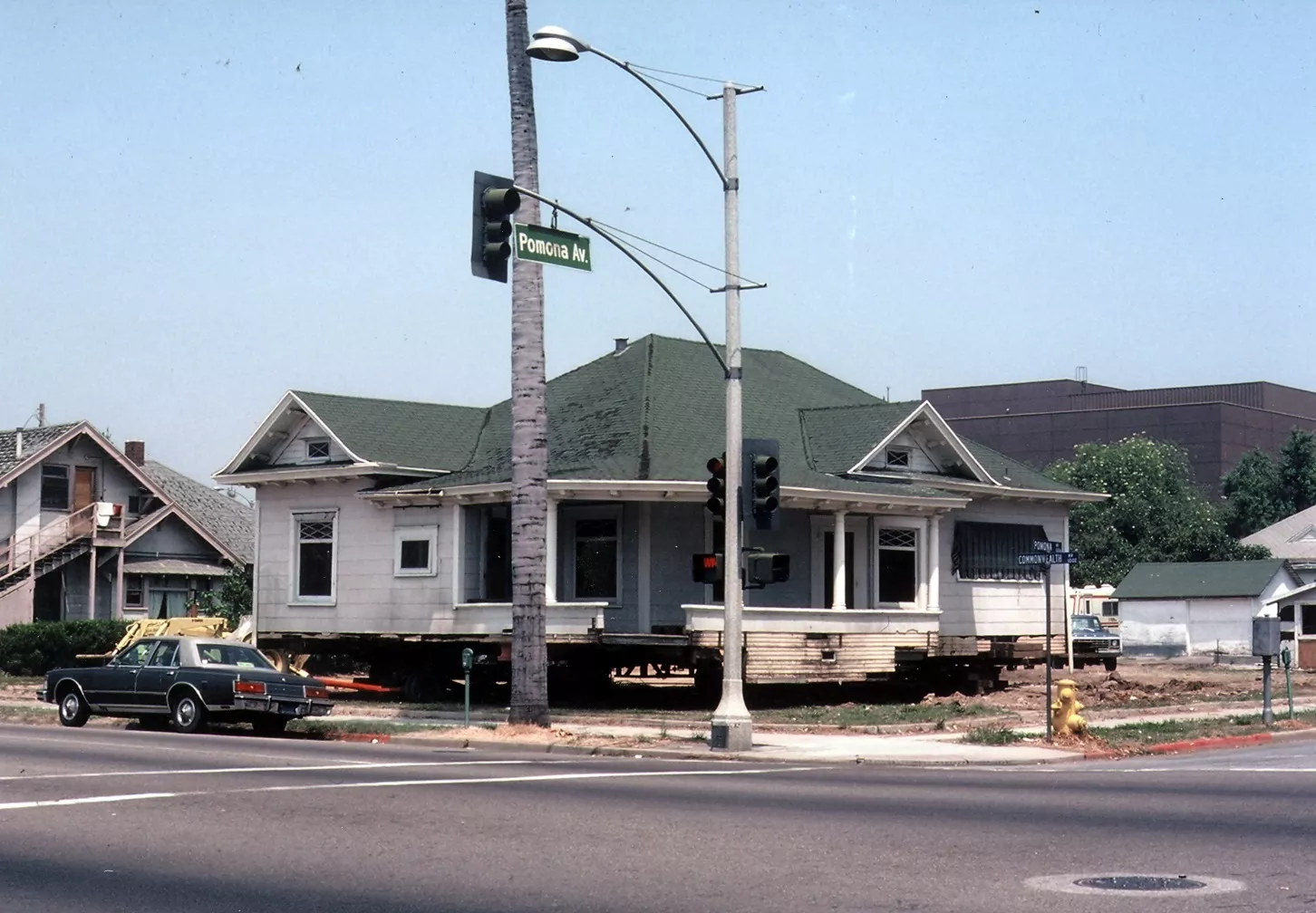 A colored photo of the Meredith Conway House on Commonwealth Avenue ready to be moved to Marion Boulevard. The photo was taken in 1980.