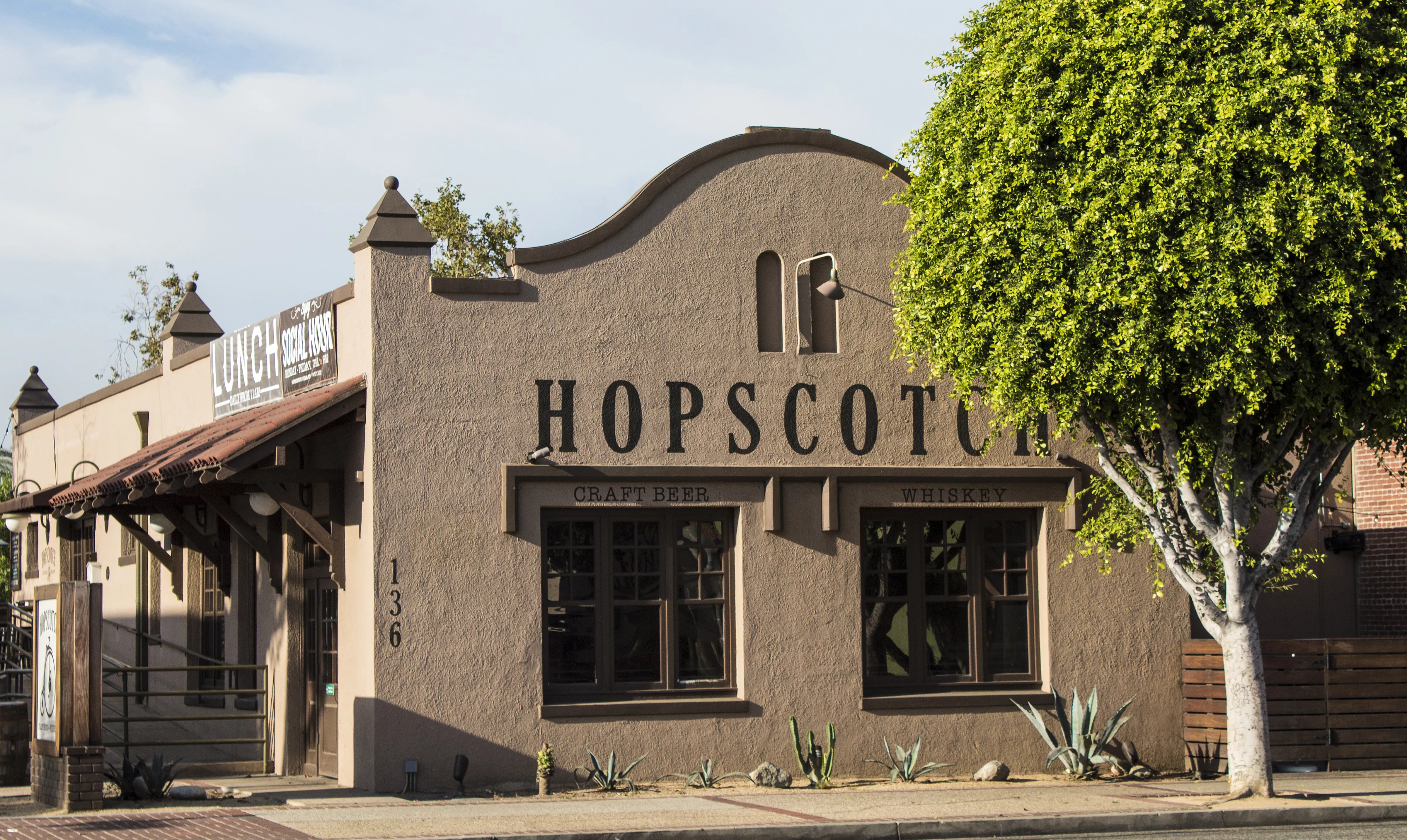 A colored photograph of the Pacific Electric Depot (now known as Hopscotch Craft Beer and Whiskey) taken in 2017.