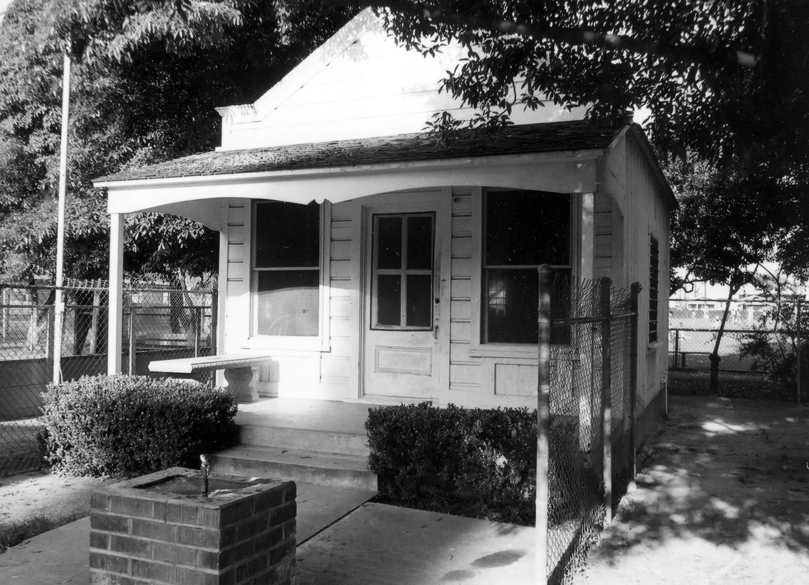 A black and white photograph of the office exterior for the Historical Building Survey in 1978.