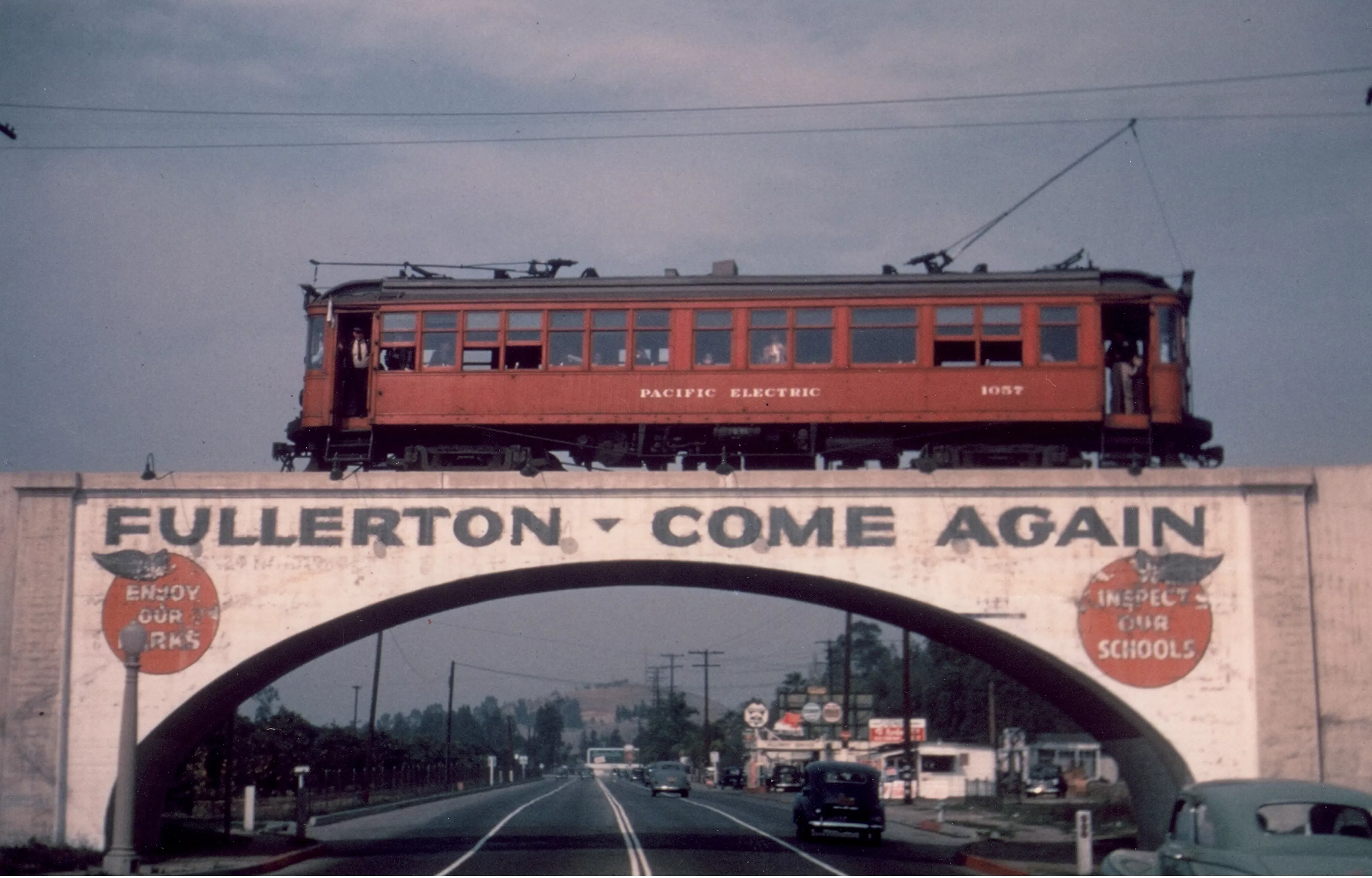 A colored photo of the Pacific Electric car crossing the viaduct.
