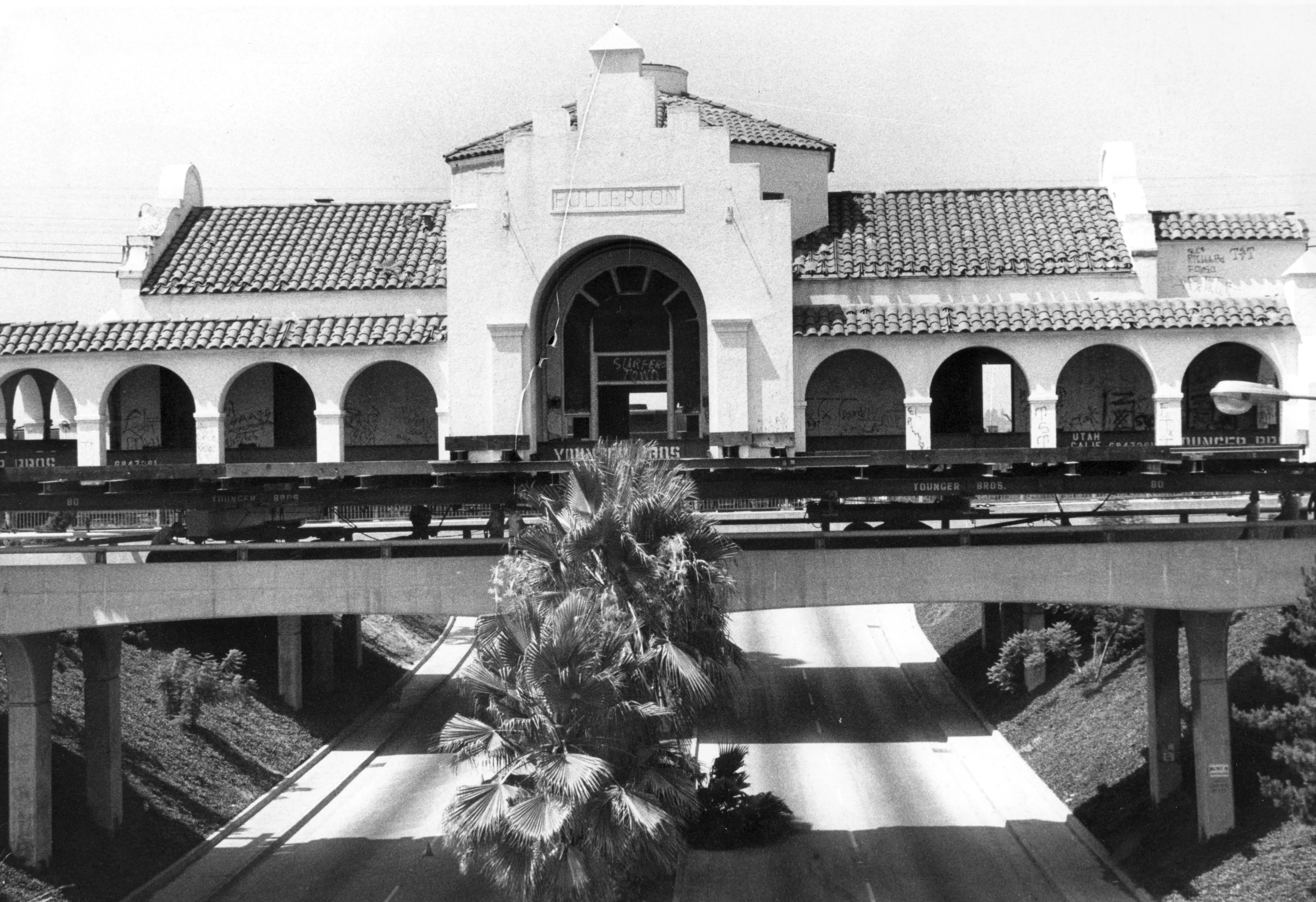 A black and white photograph of the Union Pacific Depot crossing the Harbor Underpass in 1980.