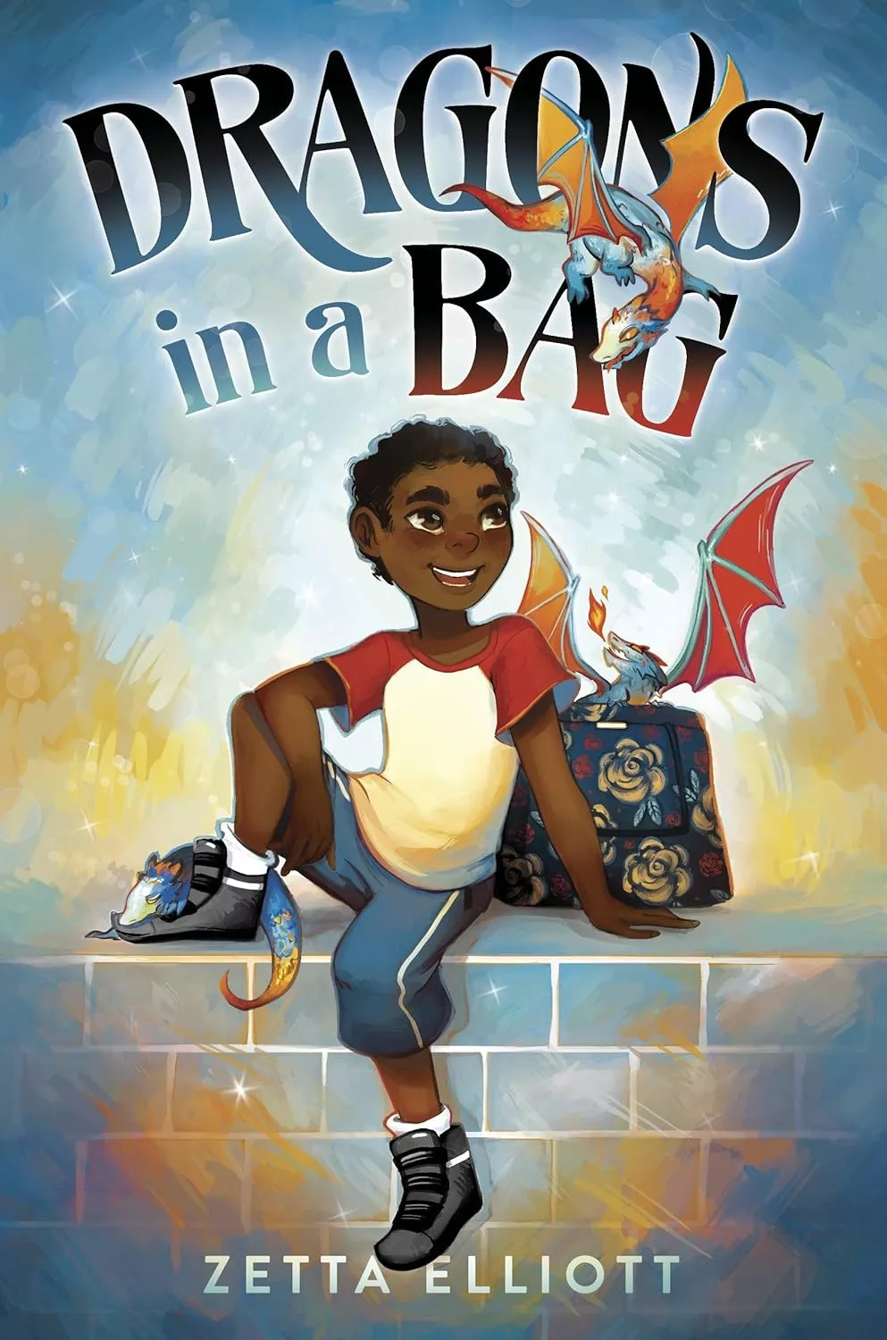 Cover of Dragons in a Bag by Zetta Elliott depicting a Black boy sitting on a brick wall. There is a small dragon curled up asleep on his foot resting on the wall. Behind him there is a floral bag with another dragon breathing fire peeking out of it.